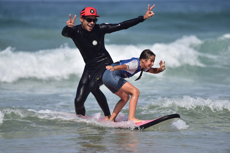 happy tandem surfing